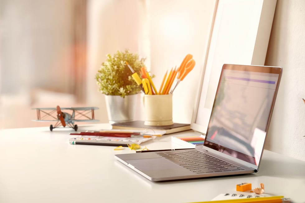 Office work table with laptop.